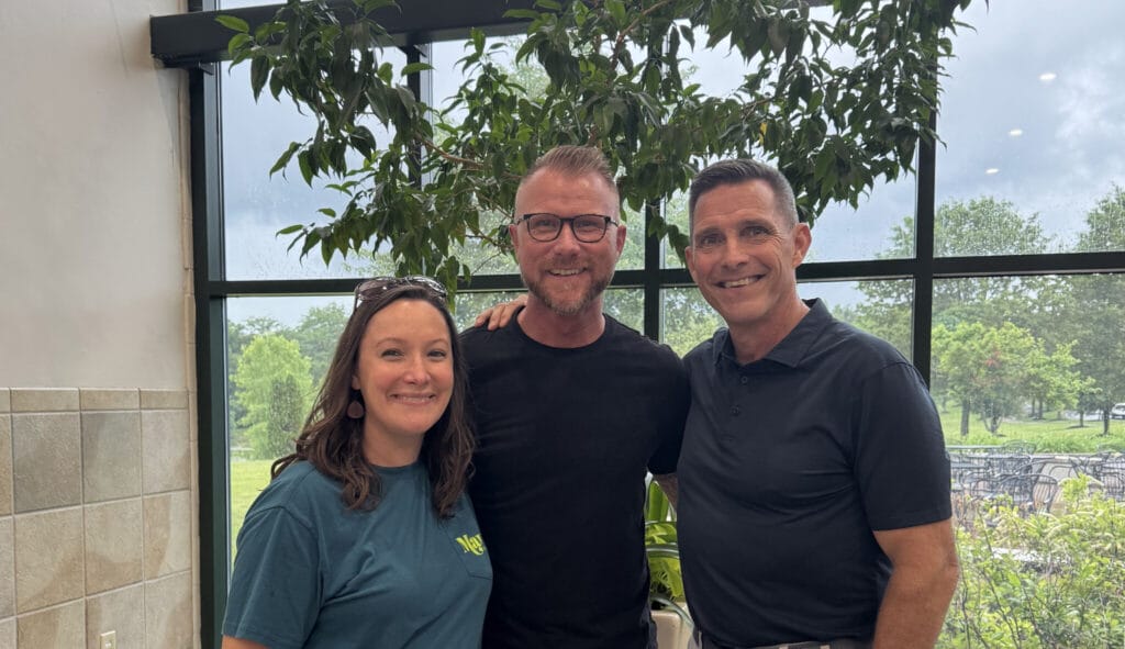 Christina Lute, Brandon Lute, and Matt Massey (L to R) stand together at Vineyard Cincinnati